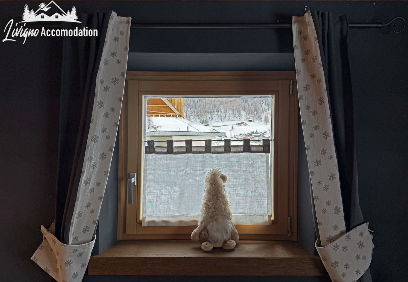 Ferienwohnung in Livigno - Chalet Moon – Familienfreundliches Apartment, im Zentrum mit privatem Garten und maximalem Komfort von Livigno Accomodation